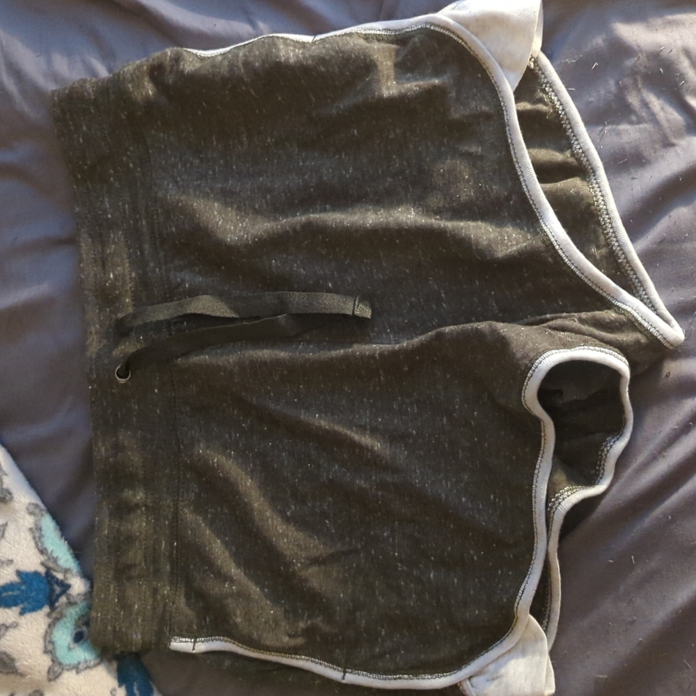 green loose shorts